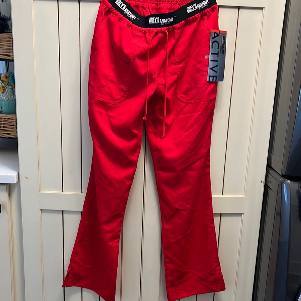 Need new scrubs? Grey’s anatomy adorable red with pockets